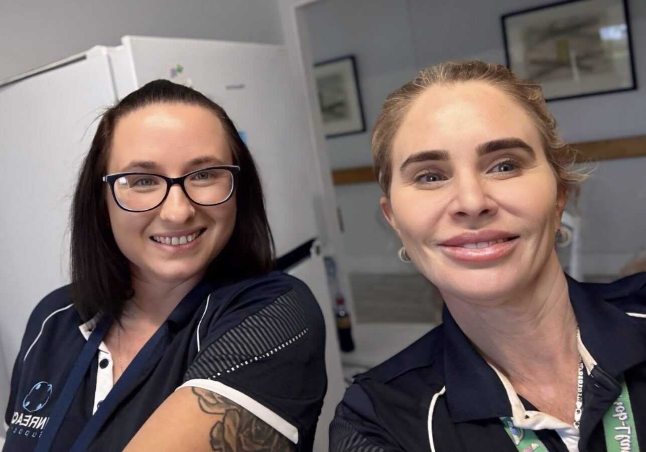 INREACH team members preparing meals for Give Back Thursday